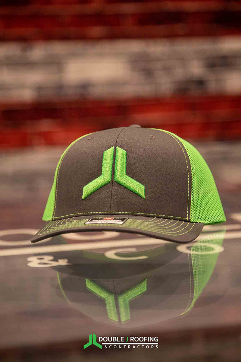 Light gray and green hat with the green Double J logo icon stitched on
