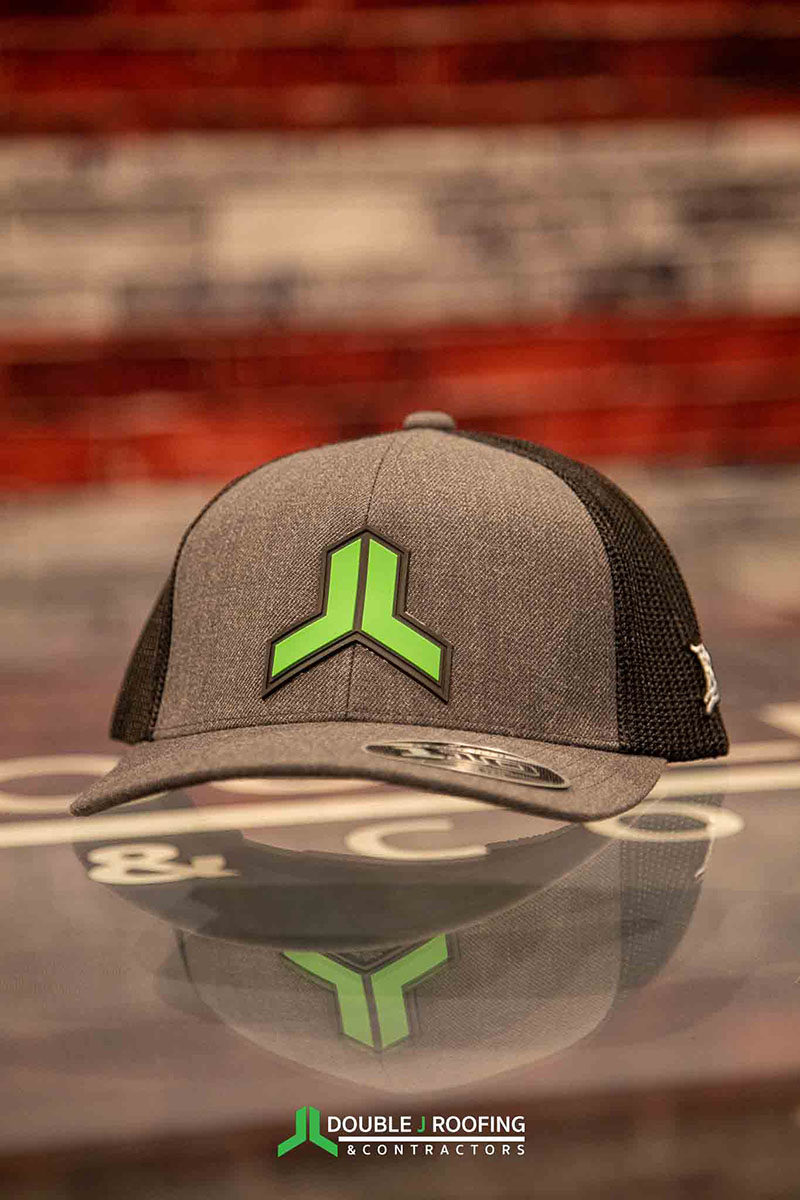 Light gray and black hat with Double J logo icon in green